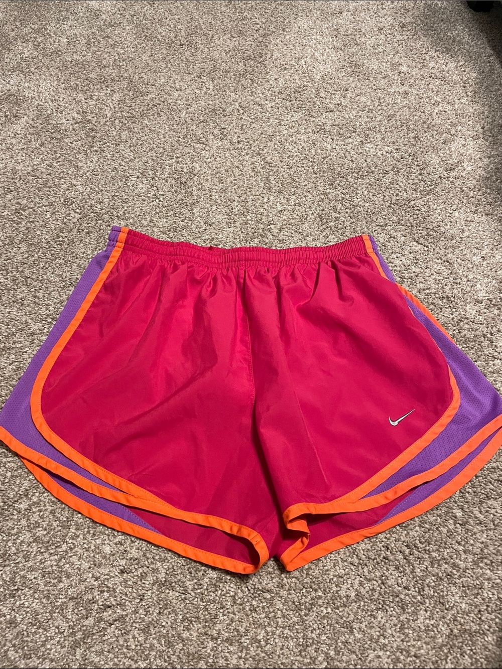 Nike Women's Hot Pink Athletic Shorts with Orange Trim and Purple Panels